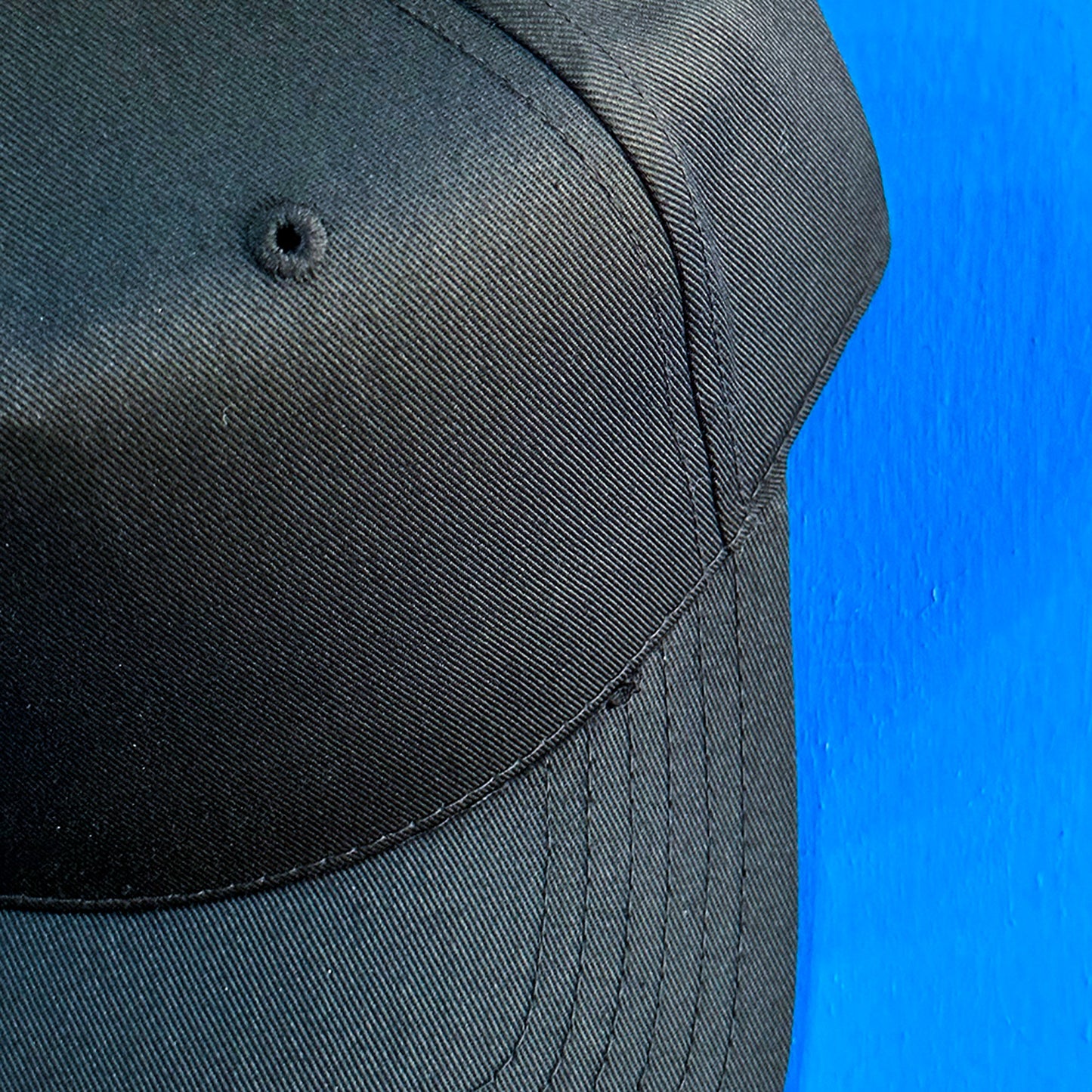 gift for swimmers black  hat personalized with your text close up of top of hat